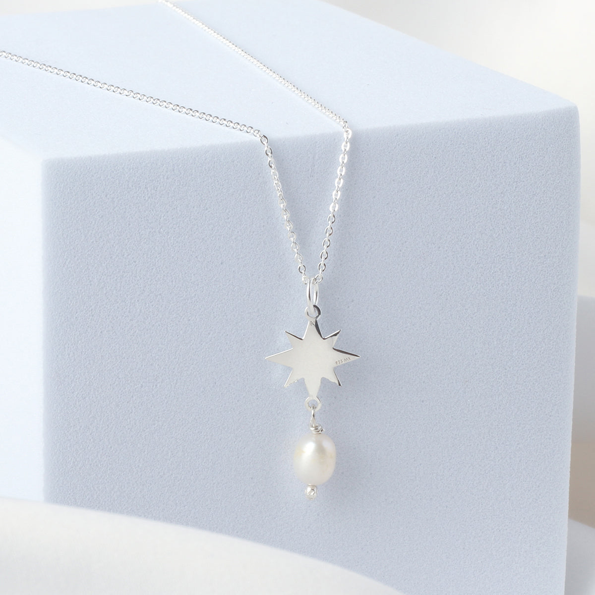 Dije estrella Astros de plata con perla
