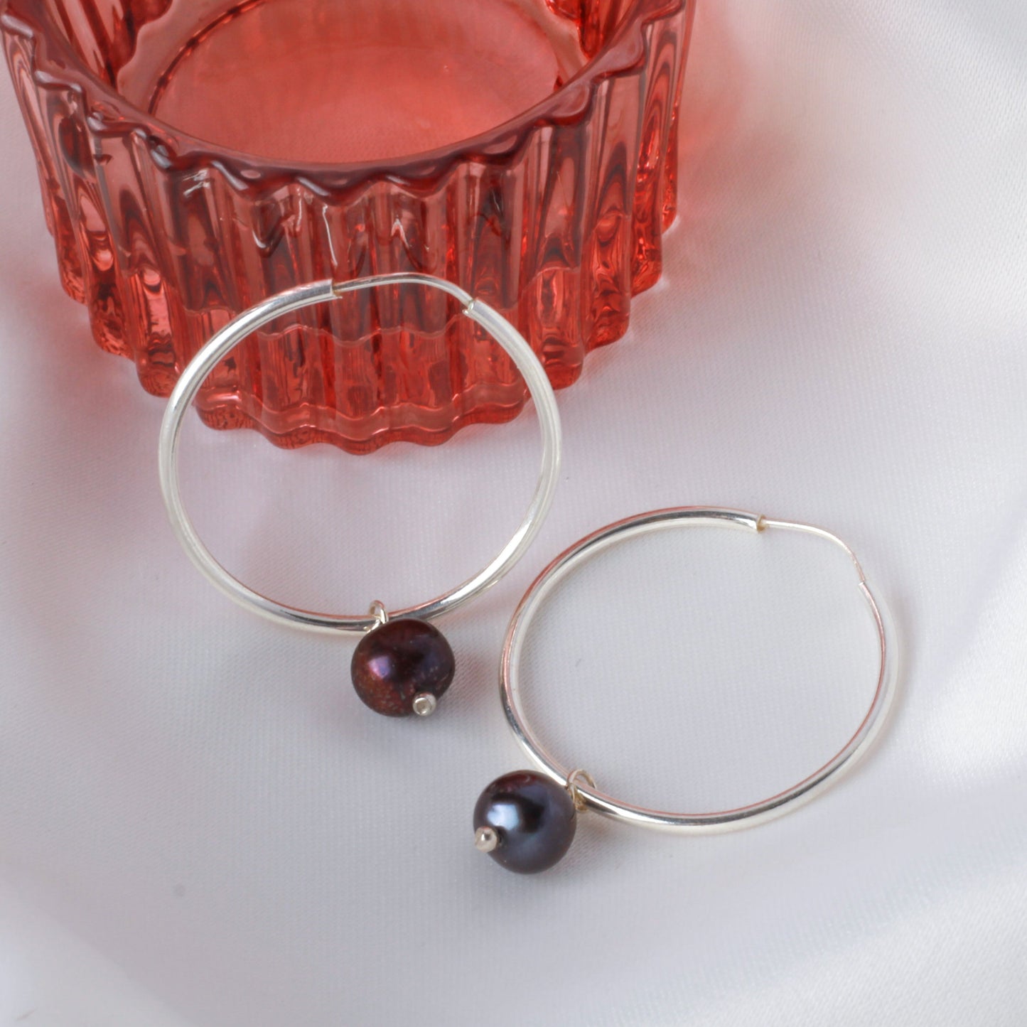 Arracadas de plata con 1 perla negra