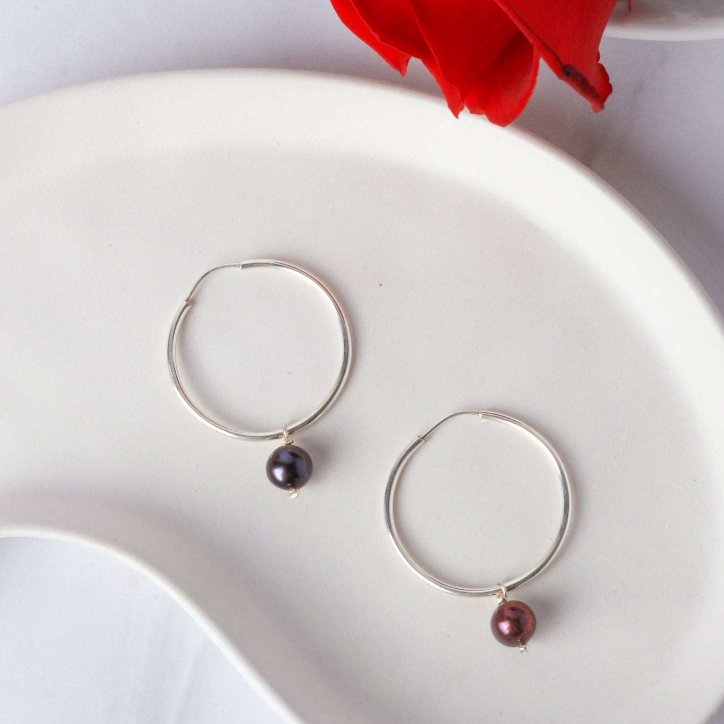 Arracadas de plata con 1 perla negra