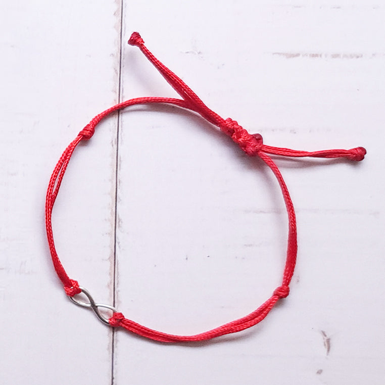 Pulsera Infinito de plata con hilo