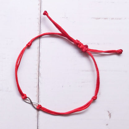 Pulsera Infinito de plata con hilo