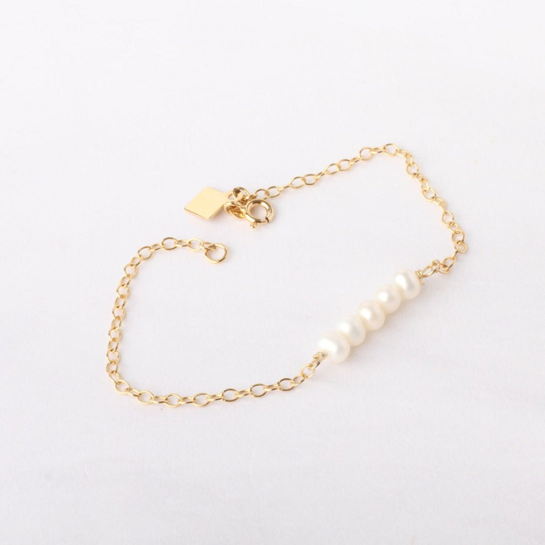 Pulsera cadena de plata con baño de oro y perlas